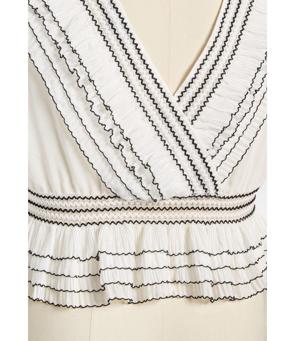 A Ruffle in Time Peplum Blouse - Plus Size